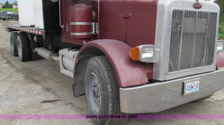 image for item E3997 1987 Peterbilt 357 flatbed truck