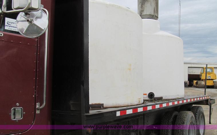 image for item E3997 1987 Peterbilt 357 flatbed truck