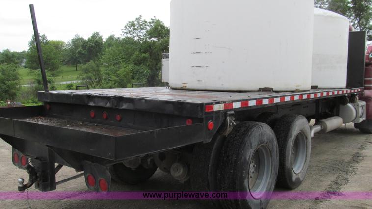 image for item E3997 1987 Peterbilt 357 flatbed truck