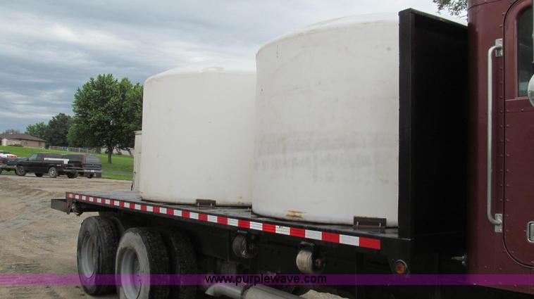 image for item E3997 1987 Peterbilt 357 flatbed truck