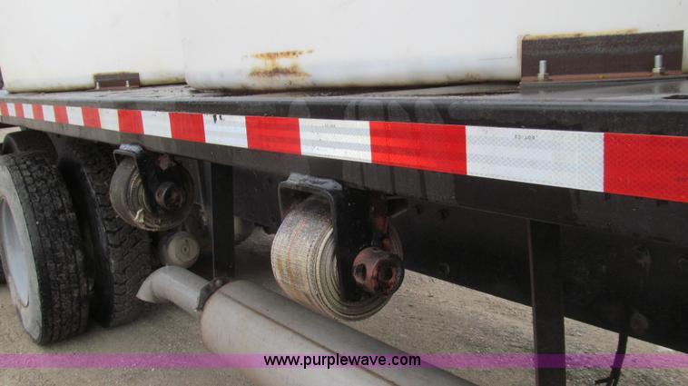 image for item E3997 1987 Peterbilt 357 flatbed truck