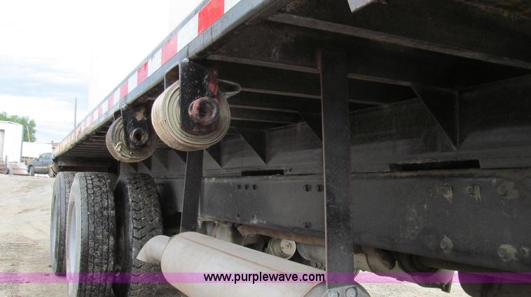 image for item E3997 1987 Peterbilt 357 flatbed truck