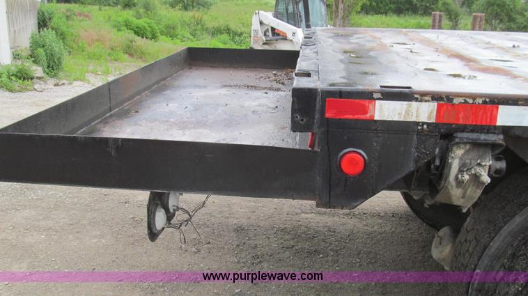 image for item E3997 1987 Peterbilt 357 flatbed truck