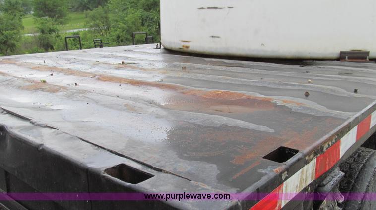 image for item E3997 1987 Peterbilt 357 flatbed truck