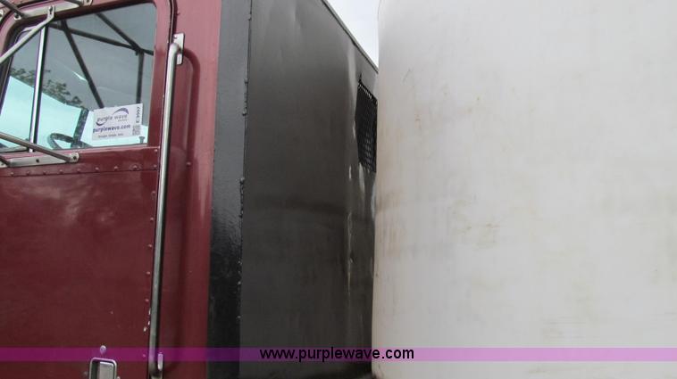 image for item E3997 1987 Peterbilt 357 flatbed truck