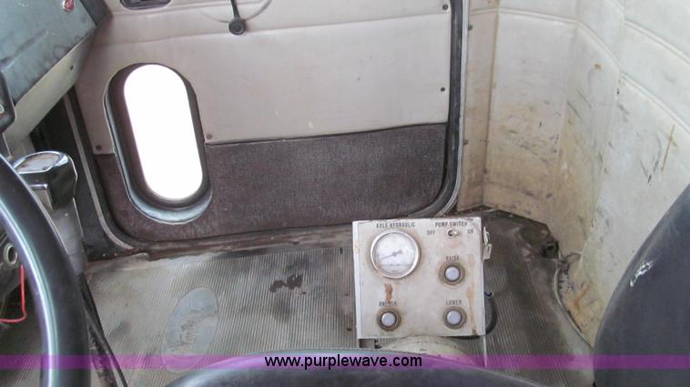 image for item E3997 1987 Peterbilt 357 flatbed truck