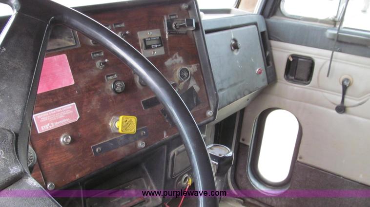 image for item E3997 1987 Peterbilt 357 flatbed truck