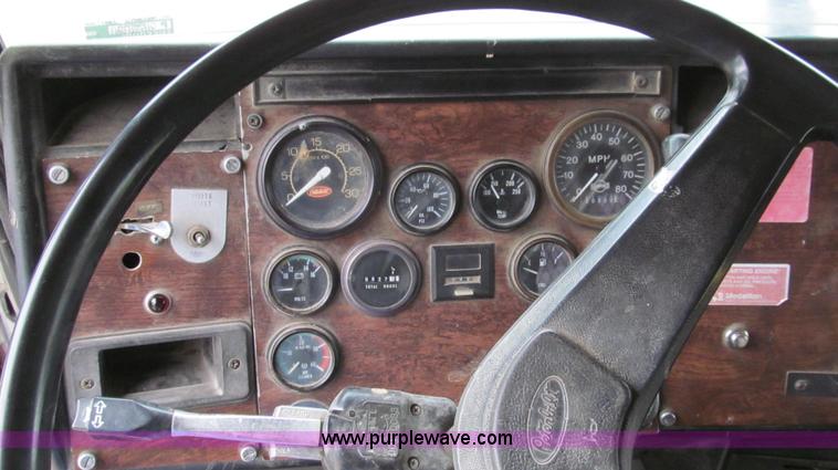 image for item E3997 1987 Peterbilt 357 flatbed truck