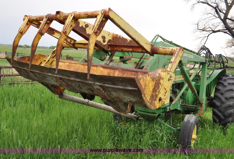 image for item G6032 1957 John Deere 720 tractor