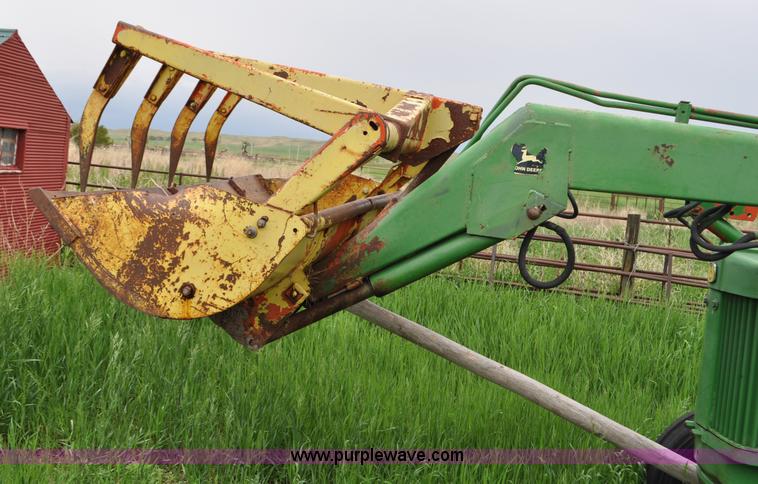 image for item G6032 1957 John Deere 720 tractor