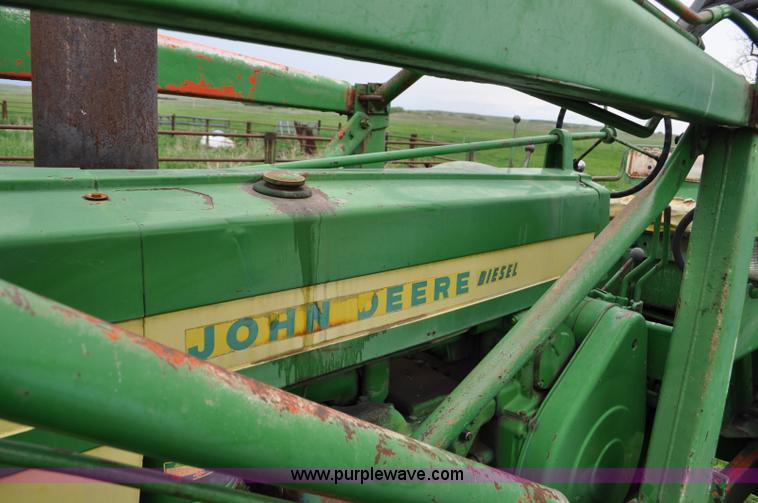 image for item G6032 1957 John Deere 720 tractor