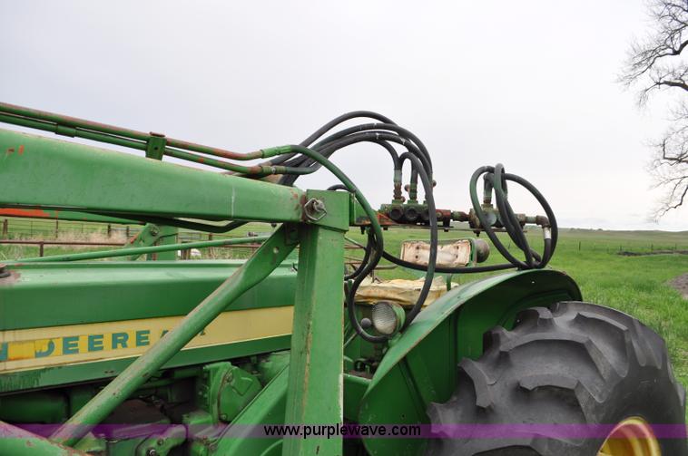 image for item G6032 1957 John Deere 720 tractor