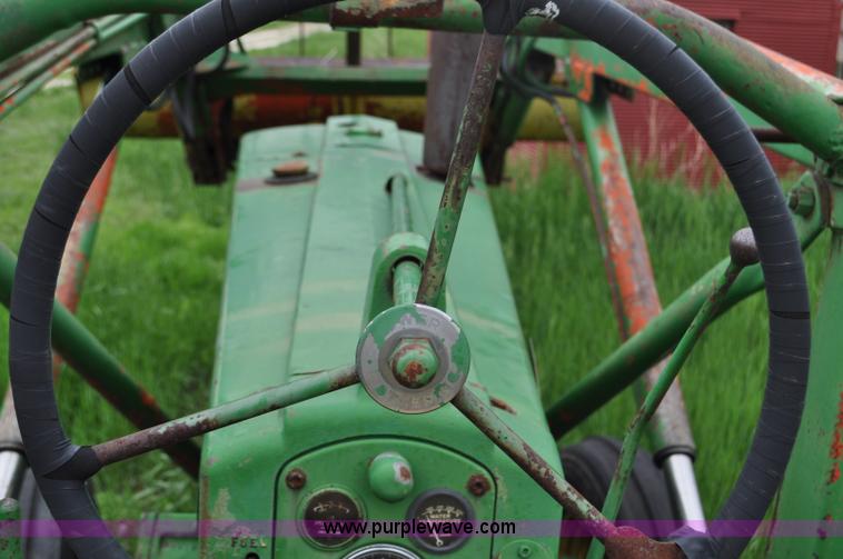 image for item G6032 1957 John Deere 720 tractor