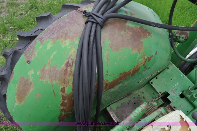 image for item G6032 1957 John Deere 720 tractor