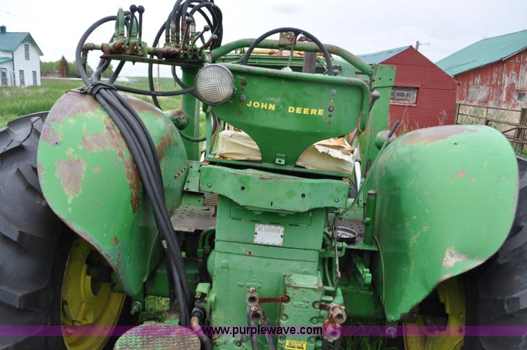 image for item G6032 1957 John Deere 720 tractor