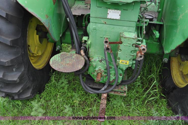 image for item G6032 1957 John Deere 720 tractor