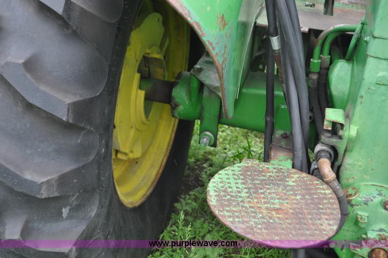 image for item G6032 1957 John Deere 720 tractor