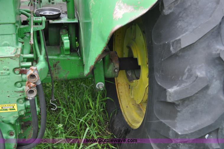 image for item G6032 1957 John Deere 720 tractor