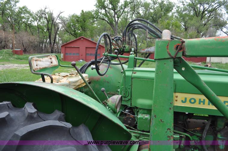 image for item G6032 1957 John Deere 720 tractor