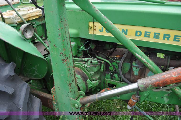 image for item G6032 1957 John Deere 720 tractor