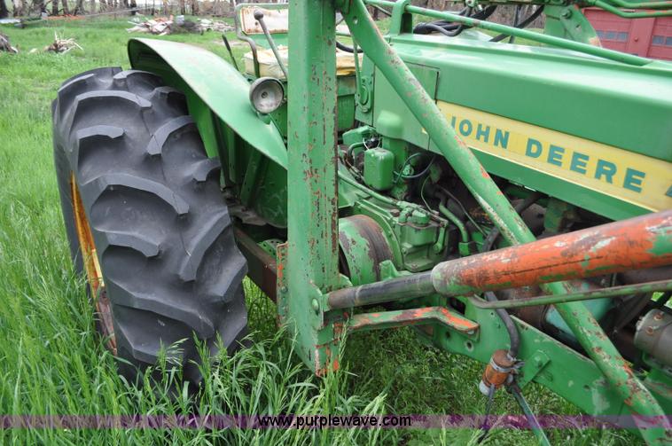 image for item G6032 1957 John Deere 720 tractor