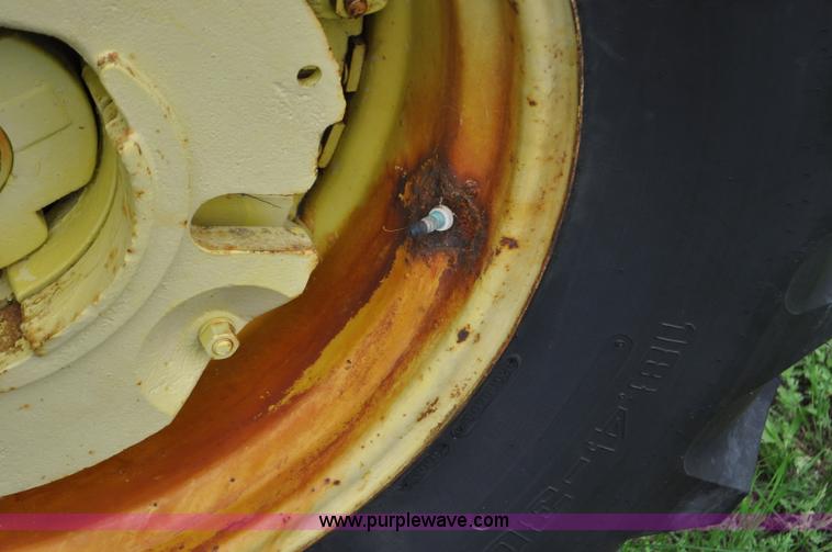 image for item G6032 1957 John Deere 720 tractor