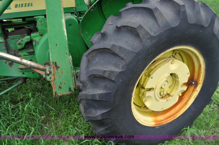 image for item G6032 1957 John Deere 720 tractor