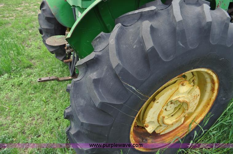 image for item G6032 1957 John Deere 720 tractor