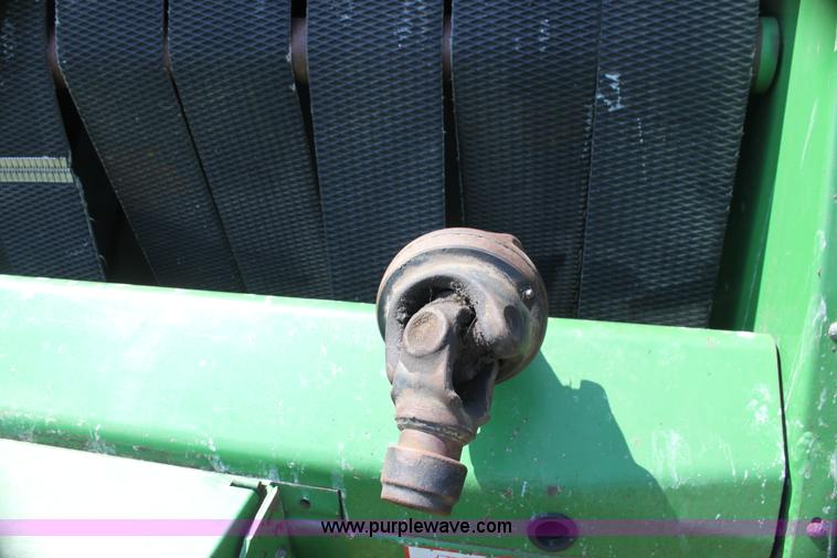image for item H7474 1992 John Deere 1520 round baler