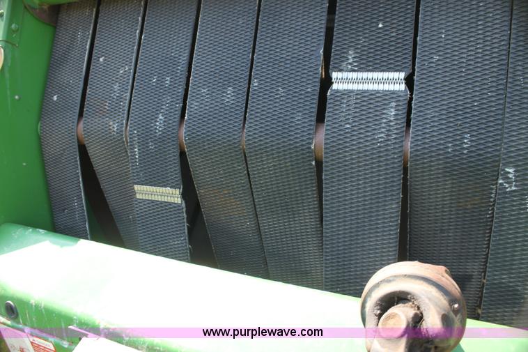 image for item H7474 1992 John Deere 1520 round baler