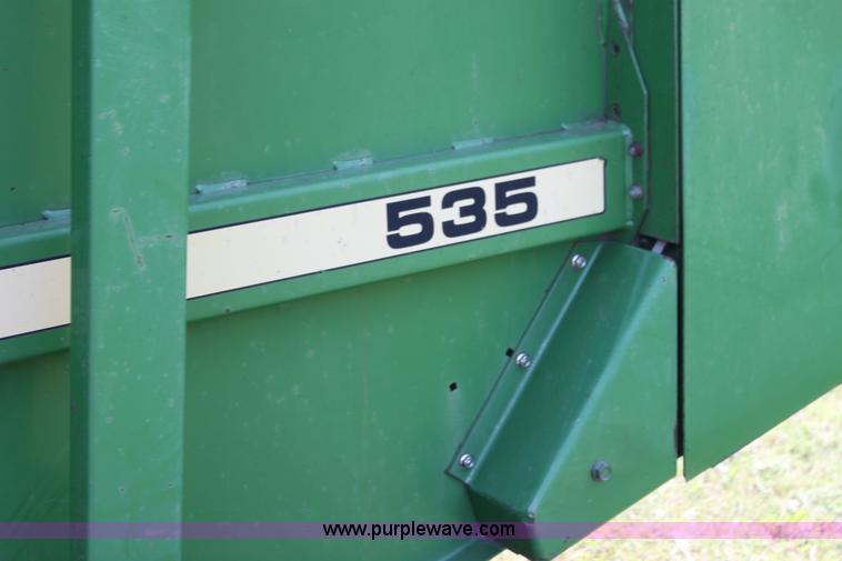 image for item H7474 1992 John Deere 1520 round baler