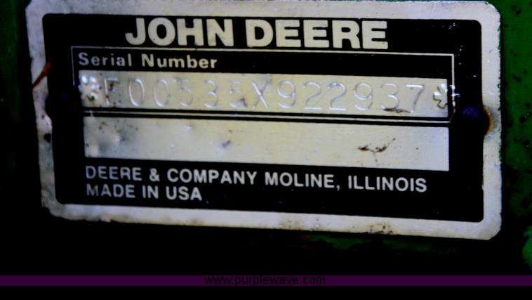 image for item H7474 1992 John Deere 1520 round baler