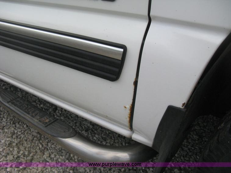 image for item D8401 2002 Chevrolet Silverado 1500 LT Extended Cab pickup truck