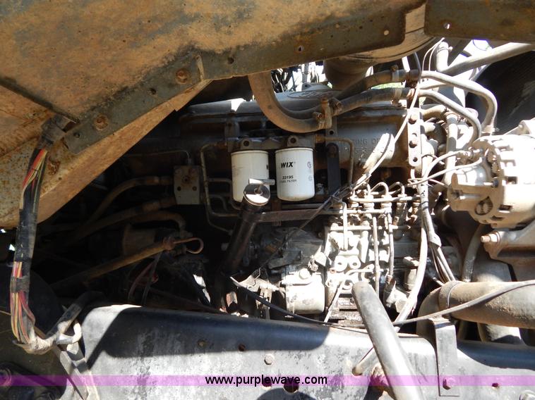 image for item G3266 1989 Ford L8000 refuse truck