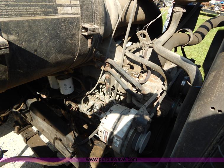 image for item G3266 1989 Ford L8000 refuse truck