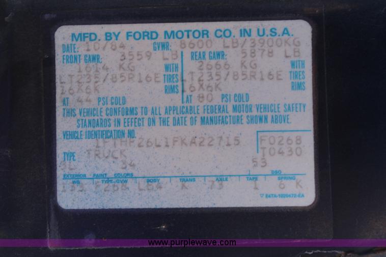 image for item G5069 1985 Ford F250 flatbed pickup truck