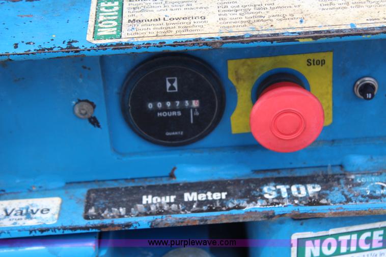 image for item G5120 1999 Genie GS2032 electric scissor lift