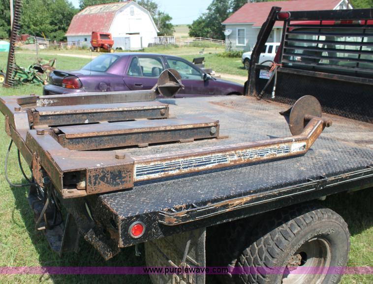 image for item H7473 1994 Ford F350 XL flatbed pickup truck