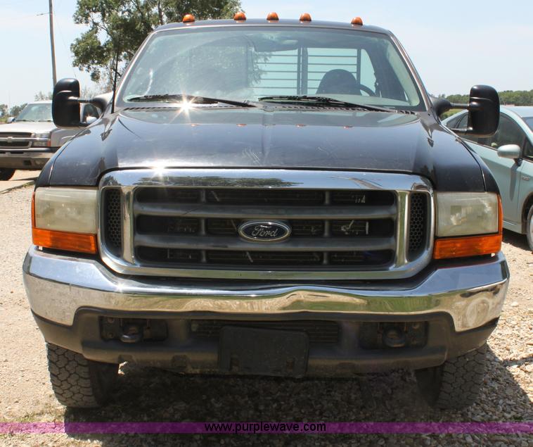 image for item H7476 1999 Ford F350 XLT flatbed truck