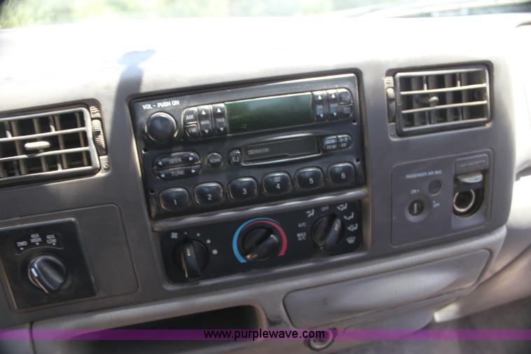 image for item H7476 1999 Ford F350 XLT flatbed truck