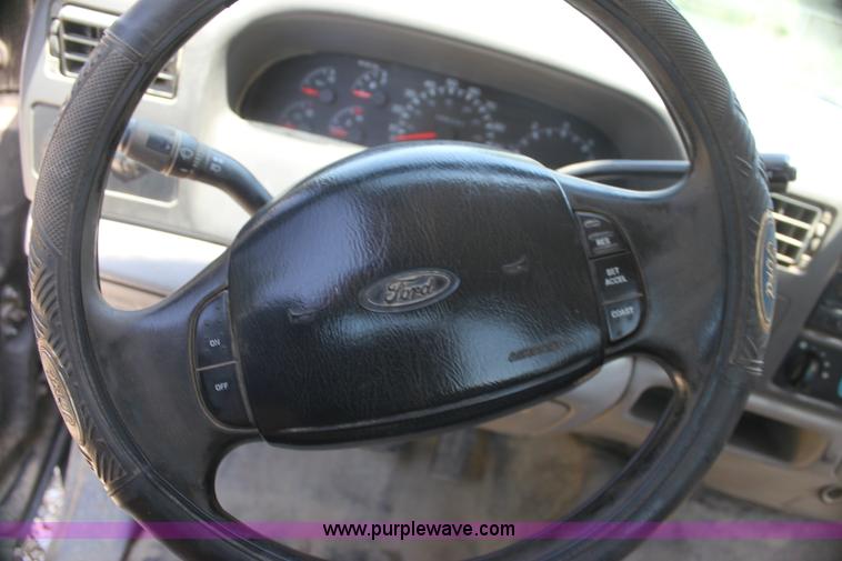 image for item H7476 1999 Ford F350 XLT flatbed truck