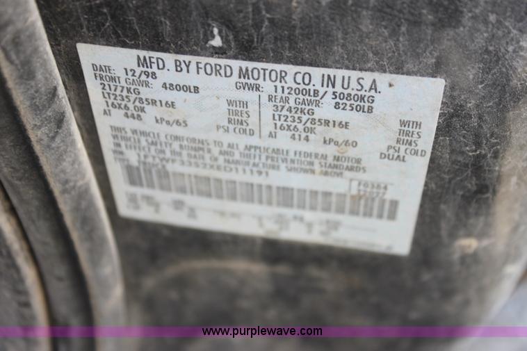 image for item H7476 1999 Ford F350 XLT flatbed truck