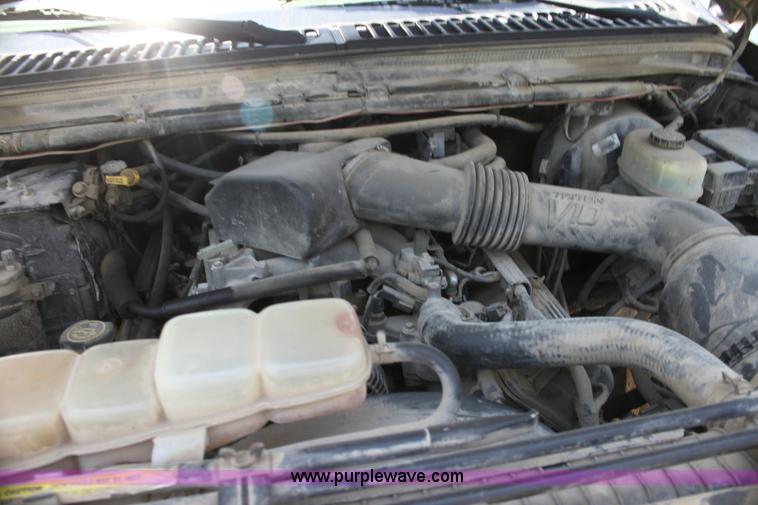 image for item H7476 1999 Ford F350 XLT flatbed truck