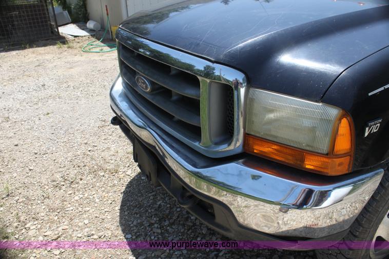 image for item H7476 1999 Ford F350 XLT flatbed truck