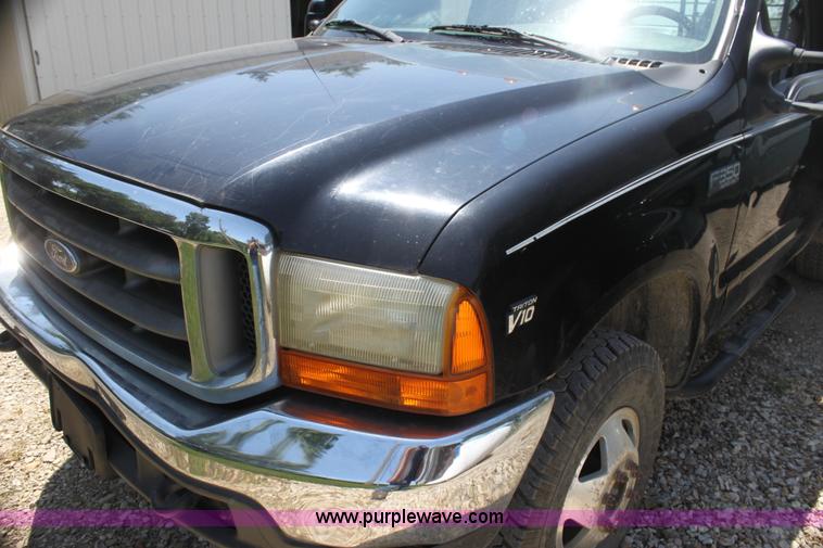 image for item H7476 1999 Ford F350 XLT flatbed truck