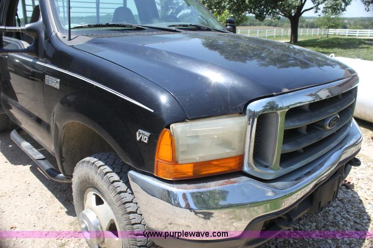 image for item H7476 1999 Ford F350 XLT flatbed truck