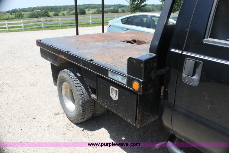 image for item H7476 1999 Ford F350 XLT flatbed truck
