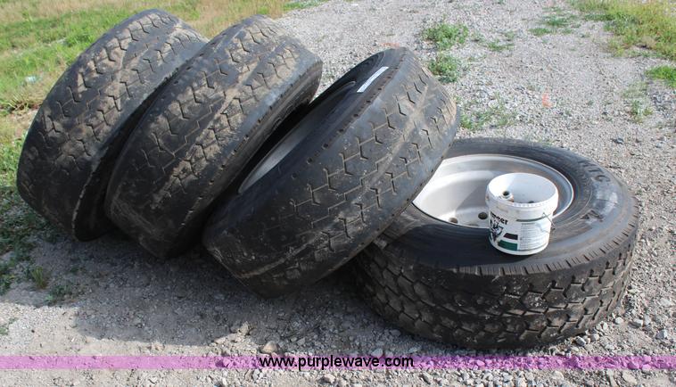 image for item X9256 (4) 385/65R22.5 tires and aluminum wheels