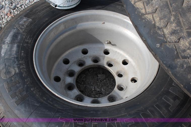 image for item X9256 (4) 385/65R22.5 tires and aluminum wheels