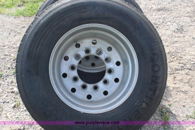 image for item X9256 (4) 385/65R22.5 tires and aluminum wheels